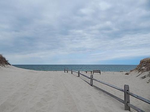 Access path between the dunes at Corn Hill Beach