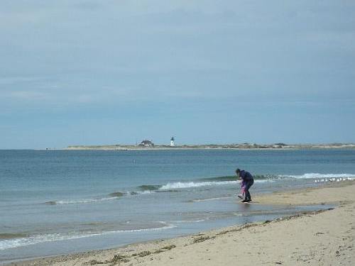 Lighthouse in the distance from Herring Cove Beach