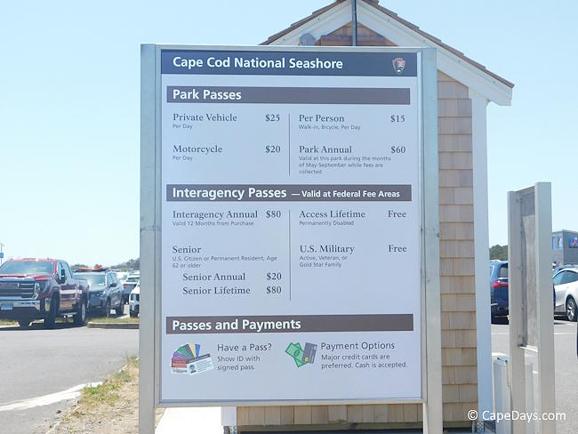 Sign at Nauset Light Beach showing National Seashore pass prices and payment options Sign at Nauset Light Beach showing National Seashore pass prices and payment options