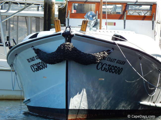 The bow (front) of a classic Coast Guard rescue boat as seen from the water