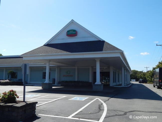 View of front entry and several designated handicap parking spots at Courtyard hotel in Hyannis View of front entry and several designated handicap parking spots at Courtyard hotel in Hyannis