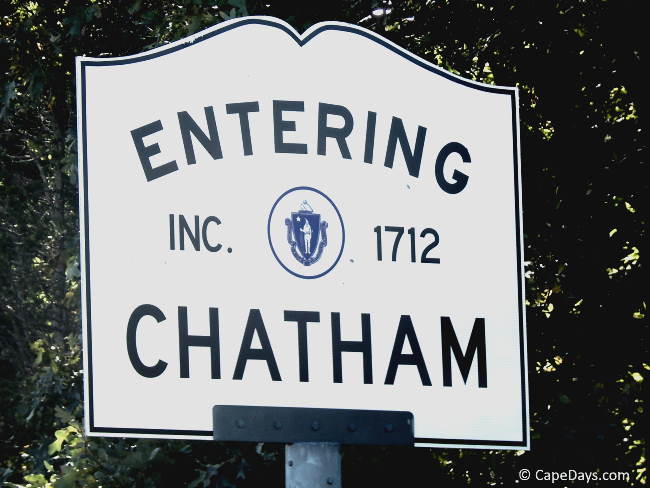 "Entering Chatham" white street sign with black trim