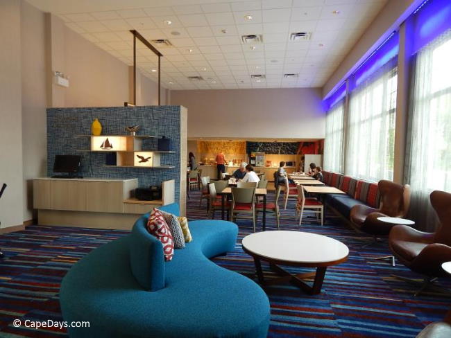 Seating in lobby and dining area at Hyannis Holiday Inn Seating in lobby and dining area at Hyannis Holiday Inn
