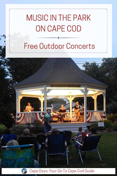 Small-town band playing in a lit-up bandstand at dusk, with people in lawn chairs enjoying the music on a Cape Cod summer evening.