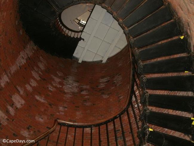 Looking up the winding, iron stairway inside the Highland Lighthouse tower