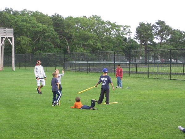 Kids playing at a Cape League game