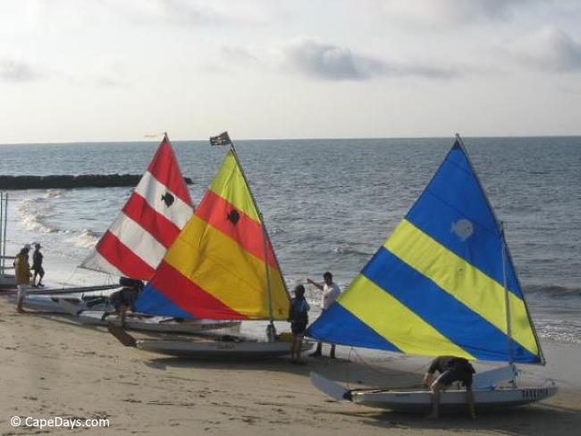 Small sailboats with colorful sails Small sailboats with colorful sails