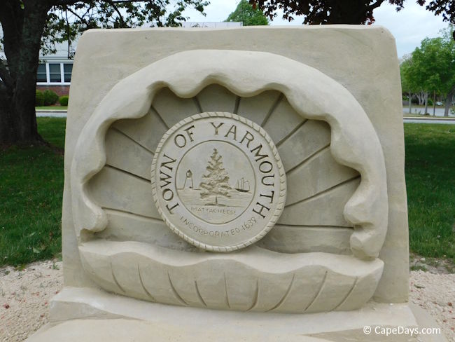 Town of Yarmouth MA logo sculpted in sand Town of Yarmouth MA logo sculpted in sand