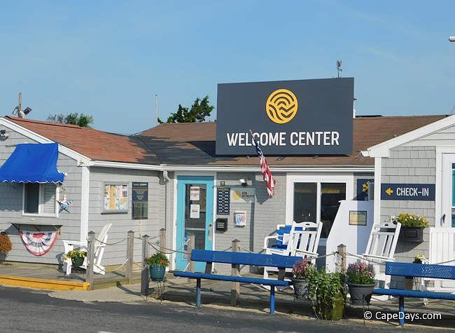 Camping area check-in office with rocking chairs and bench seating on the patio Camping area check-in office with rocking chairs and bench seating on the patio