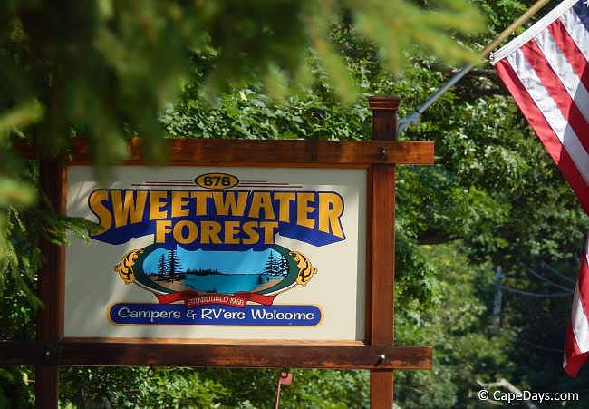 Sweetwater Forest's roadside sign welcoming campers and RVers Sweetwater Forest's roadside sign welcoming campers and RVers