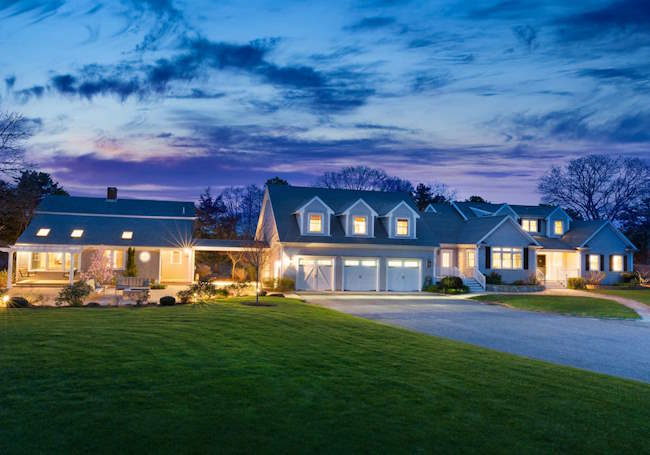Evening view of beautiful two-home estate. Click the photo to see the listing.