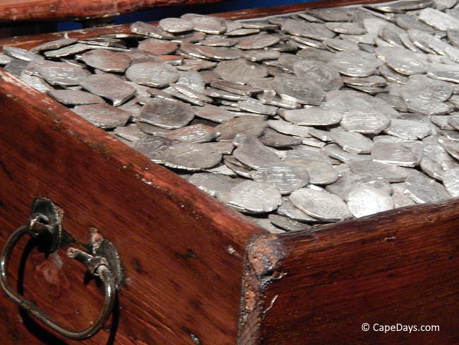Pirate treasure: a chest full of silver coins Pirate treasure: a chest full of silver coins