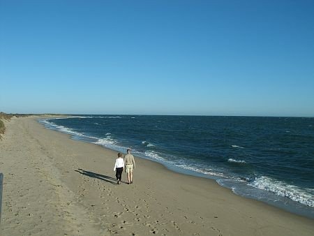 couple walking on south cape beach